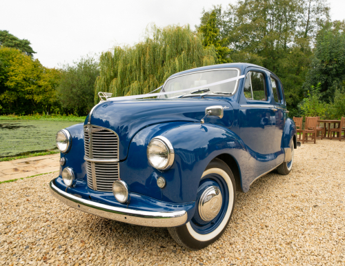 Vintage Austin A40 wedding car parked at Hornsbury Mill, Chard