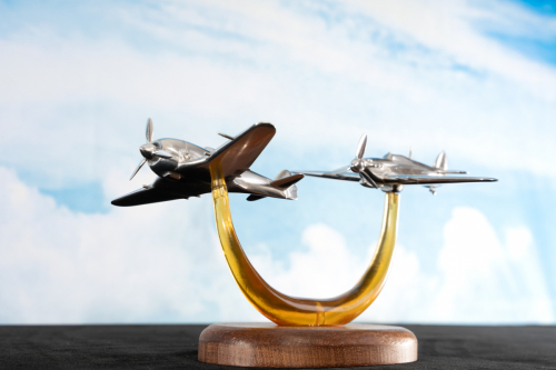Second angle of Burma 1944 aluminium sculpture, showing Hurricane and Ki-44 Shōki aircraft in dynamic WWII air battle.
