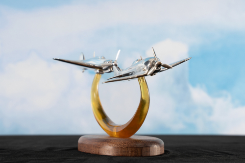 Third view of aluminium sculpture featuring Burma 1944 aerial combat with Hawker Hurricane and Nakajima Ki-44 Shōki fighters.