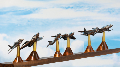 Second perspective of “The Cold War” aluminium sculpture, showing 1950s–70s Sea Vixen, Lightning, Scimitar, Javelin, Hunter, and Buccaneer aircraft.