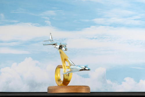 Second view of Falklands 1982 aluminium sculpture, showing Sea Harrier and Mirage III jets in mid-flight engagement.