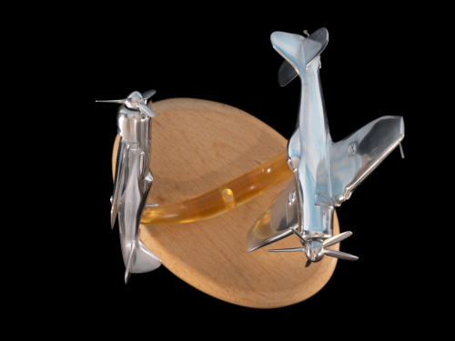 Second perspective of Korea 1950 aluminium sculpture showing detailed Sea Fury and Lavochkin La-11 aircraft.