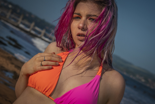 Bikini shoot with wind-swept hair, Dawlish Warren seafront