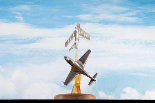 Aluminium sculpture depicting Suez Crisis 1956 aerial combat, showing Hawker Sea Hawk and MiG-17 jets.