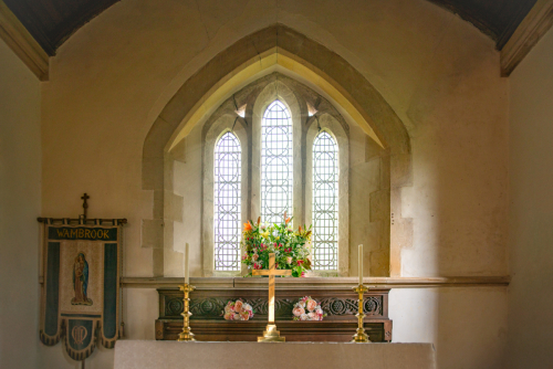 Wide view of wedding altar inside Wambrook Church
