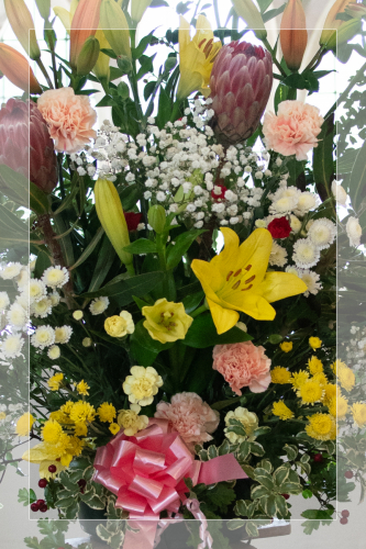 Wedding flower detail with white border arrangement at Wambrook Church