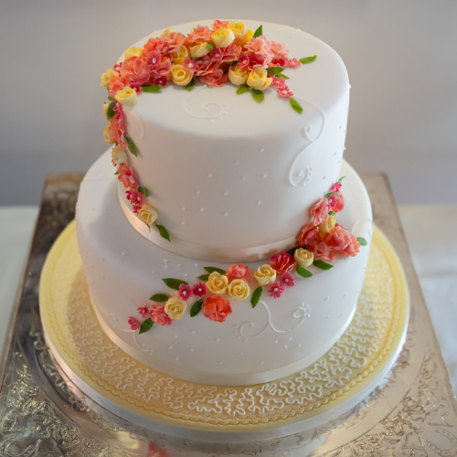 Close-up detail of wedding cake at Hornsbury Mill reception in Chard